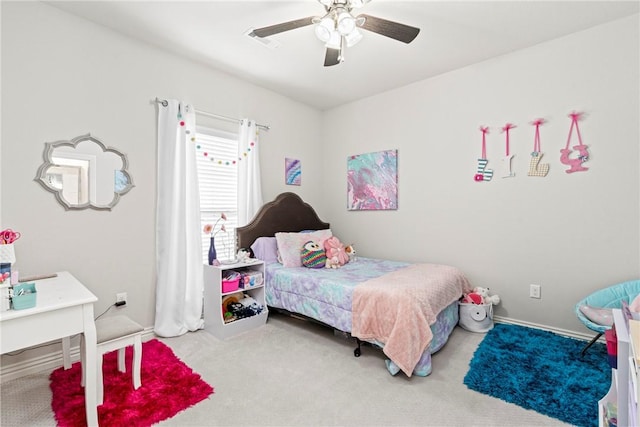 bedroom with visible vents, carpet flooring, and a ceiling fan