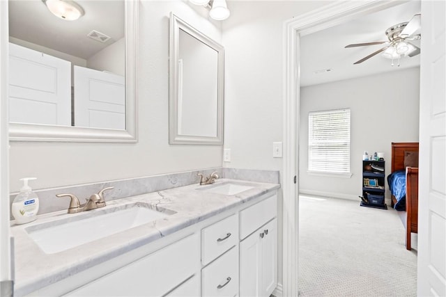 full bathroom with visible vents, a sink, a ceiling fan, and double vanity
