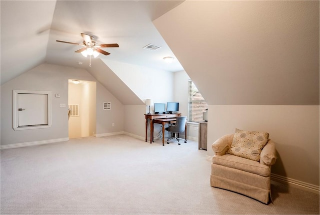 interior space featuring visible vents, a ceiling fan, vaulted ceiling, and light carpet
