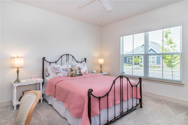 6761 Somerset Pl, Springdale, AR 72762 - carpeted bedroom featuring baseboards and a ceiling fan