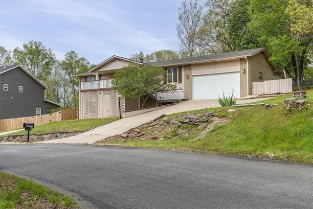 5 Sorbie Dr, Bella Vista, AR 72715 - single story home featuring concrete driveway, an attached garage, and stucco siding