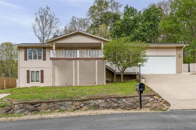 5 Sorbie Dr, Bella Vista, AR 72715 - view of front of home with concrete driveway and an attached garage