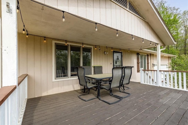 5 Sorbie Dr, Bella Vista, AR 72715 - wooden terrace with outdoor dining area