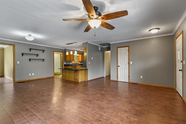 5 Sorbie Dr, Bella Vista, AR 72715 - unfurnished living room featuring a ceiling fan, crown molding, and dark wood-style flooring