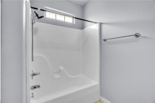full bath featuring shower / bath combination