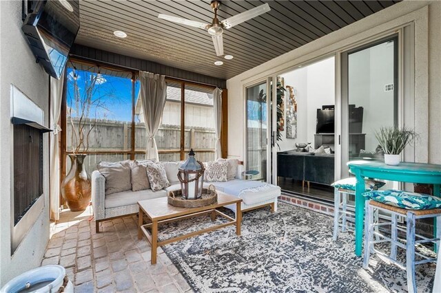 113 SE F St, Bentonville, AR 72712 - sunroom with recessed lighting, wooden ceiling, and brick floor