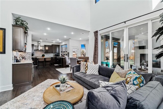 113 SE F St, Bentonville, AR 72712 - living area featuring recessed lighting and dark wood finished floors