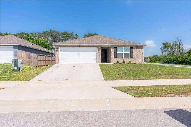 3715 S 1st Pl, Rogers, AR 72758 - ranch-style house with fence, brick siding, a garage, a front yard, and concrete driveway