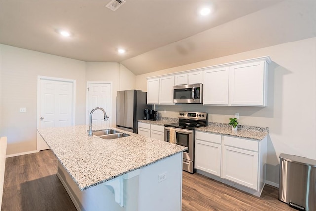 3715 S 1st Pl, Rogers, AR 72758 - kitchen with a sink, stainless steel appliances, white cabinetry, visible vents, and a center island with sink