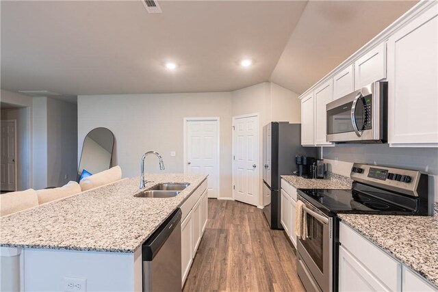 3715 S 1st Pl, Rogers, AR 72758 - kitchen with a center island with sink, a sink, white cabinets, dark wood-style floors, and stainless steel appliances