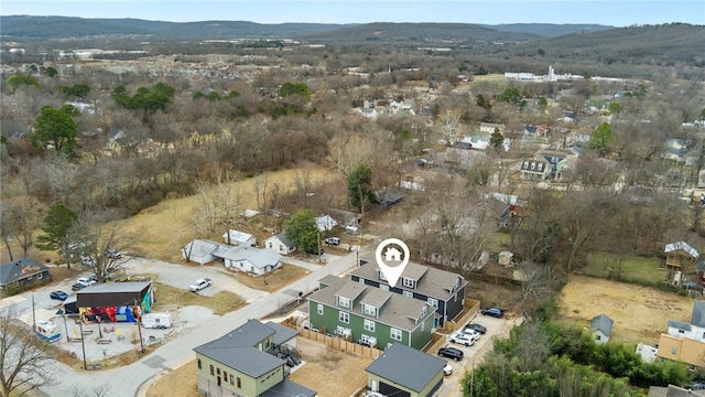 drone / aerial view with a residential view and a mountain view