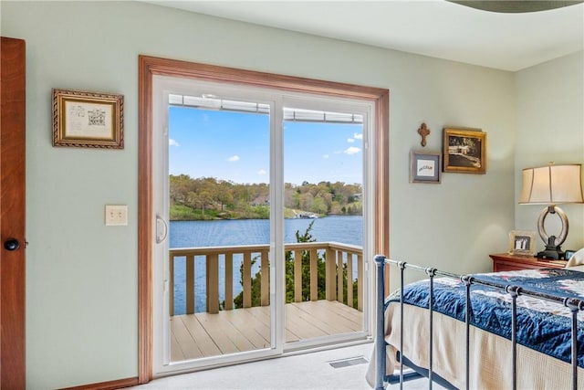 50 Churchill Dr, Bella Vista, AR 72715 - bedroom featuring a water view, visible vents, and access to exterior