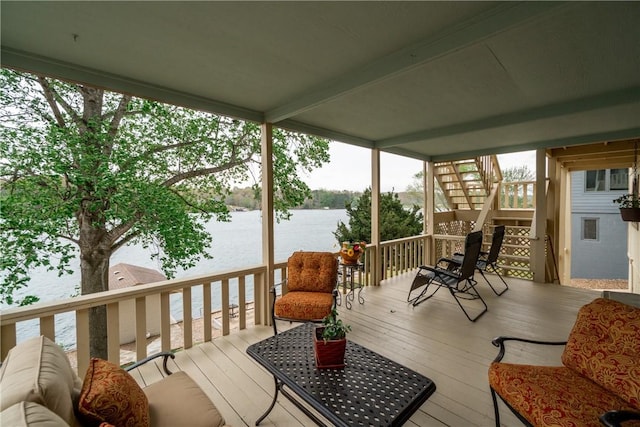 50 Churchill Dr, Bella Vista, AR 72715 - wooden deck featuring a water view and stairway
