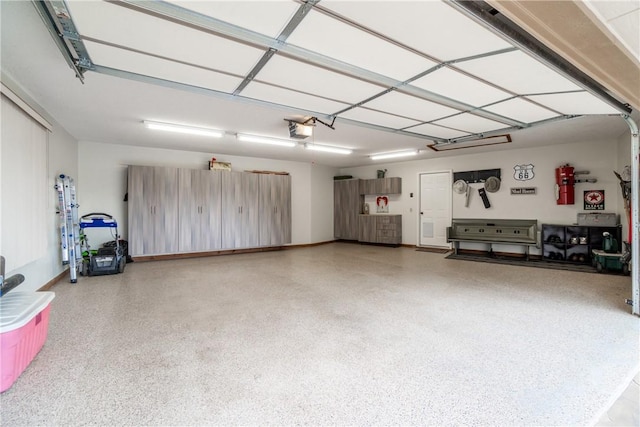 garage featuring a garage door opener