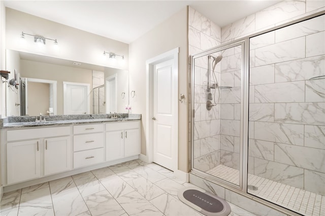 4311 SW Pawhuska St, Bentonville, AR 72713 - bathroom featuring double vanity, a shower stall, a sink, and marble finish floor