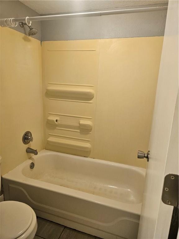 full bathroom with shower / bath combination and toilet