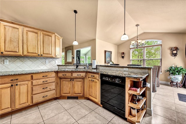 kitchen with light tile patterned flooring, a sink, dishwasher, decorative backsplash, and lofted ceiling