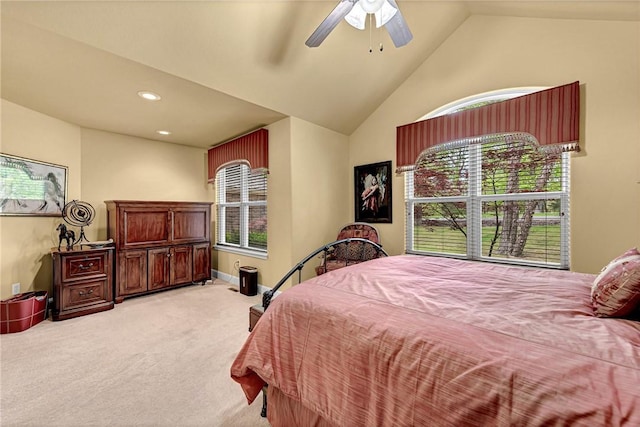 bedroom with recessed lighting, lofted ceiling, multiple windows, and light carpet