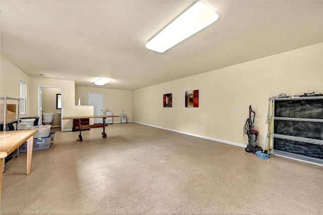 playroom featuring speckled floor