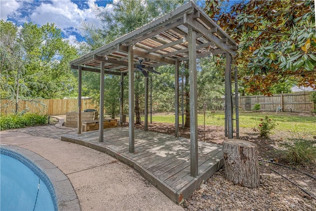 302 4th Ave, Gravette, AR 72736 - view of patio featuring a wooden deck, a fenced backyard, and a pergola