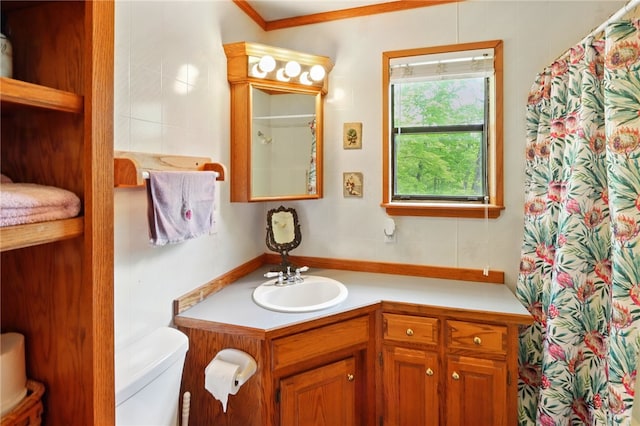 full bathroom with crown molding, vanity, a shower with curtain, and toilet