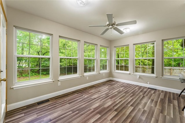 2 Saxilby Ln, Bella Vista, AR 72715 - unfurnished sunroom featuring baseboards, visible vents, and a healthy amount of sunlight