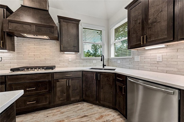 4 Lothian Dr, Bella Vista, AR 72715 - kitchen with stainless steel appliances, custom exhaust hood, a sink, decorative backsplash, and lofted ceiling