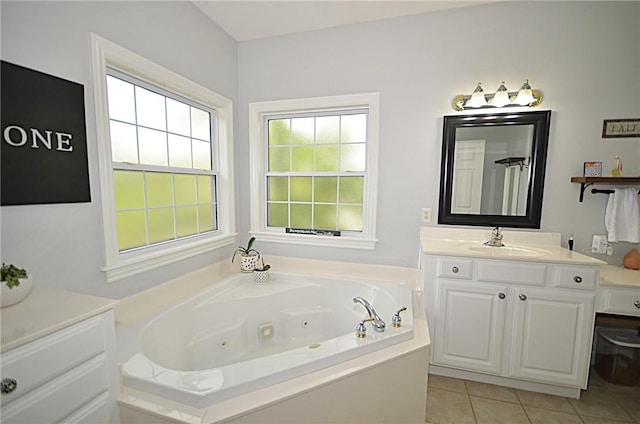 bathroom featuring vanity, tile patterned floors, and a jetted tub