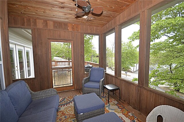 3 Evelynia Cir, Bella Vista, AR 72715 - sunroom with wood ceiling, ceiling fan, and wooden walls