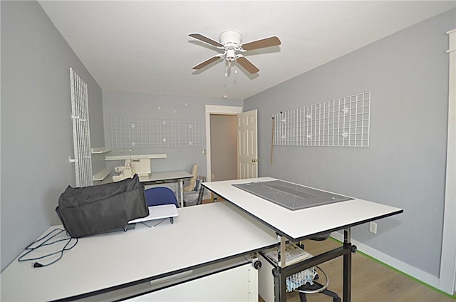 3 Evelynia Cir, Bella Vista, AR 72715 - home office featuring baseboards, ceiling fan, and wood finished floors