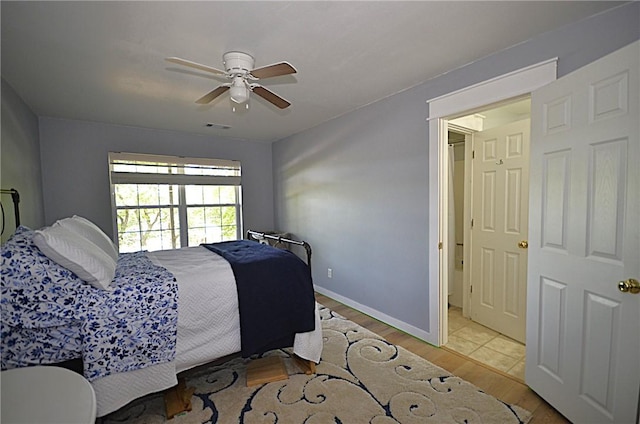 3 Evelynia Cir, Bella Vista, AR 72715 - bedroom featuring baseboards, ceiling fan, wood finished floors, and visible vents