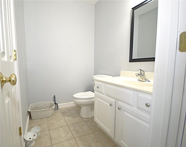 3 Evelynia Cir, Bella Vista, AR 72715 - bathroom featuring toilet, baseboards, tile patterned flooring, and vanity