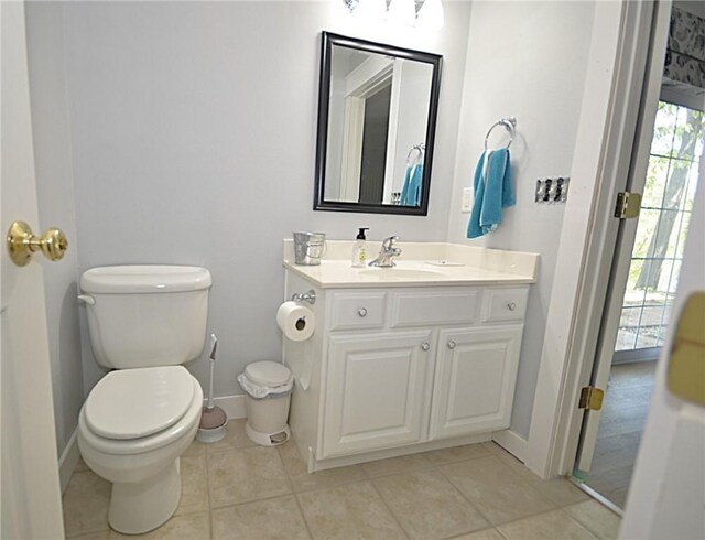 3 Evelynia Cir, Bella Vista, AR 72715 - bathroom featuring baseboards, tile patterned flooring, and toilet