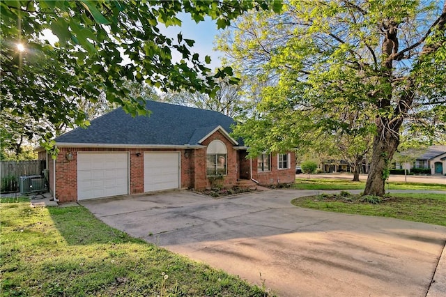 ranch-style house featuring driveway, central AC unit, a garage, brick siding, and fence