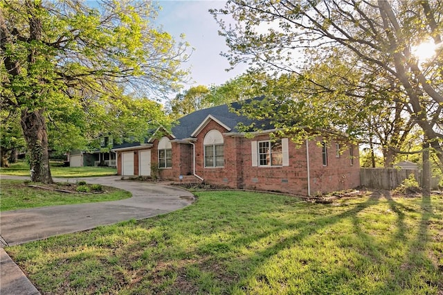 ranch-style house featuring fence, a front lawn, brick siding, a garage, and crawl space