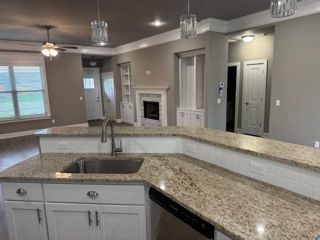 681 Baggett St, Prairie Grove, AR 72753 - kitchen featuring open floor plan, ceiling fan, white cabinetry, a sink, and dishwasher