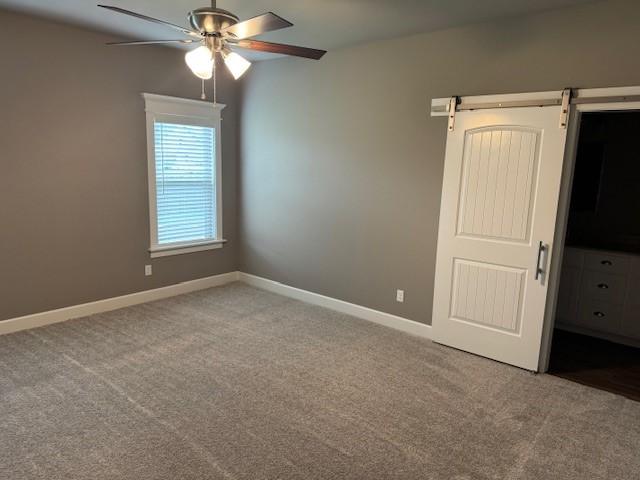 681 Baggett St, Prairie Grove, AR 72753 - empty room with carpet flooring, ceiling fan, and baseboards