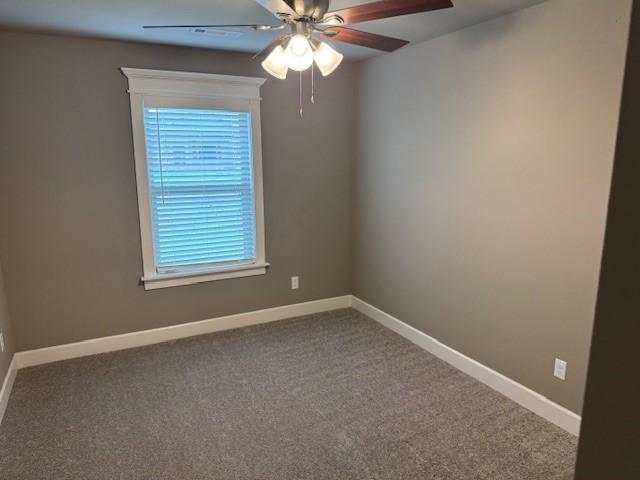 681 Baggett St, Prairie Grove, AR 72753 - carpeted spare room featuring ceiling fan and baseboards