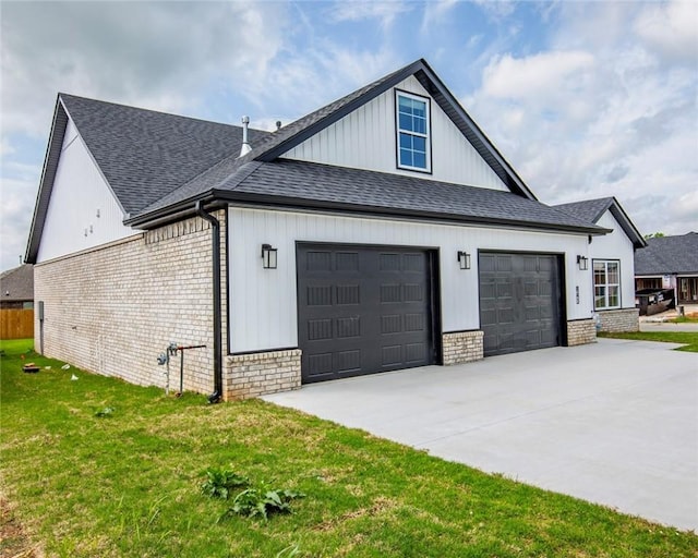 view of home's exterior with concrete driveway, brick siding, roof with shingles, and a garage