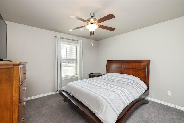 4008 SW Roundstone Blvd, Bentonville, AR 72713 - bedroom featuring a ceiling fan, baseboards, and dark colored carpet