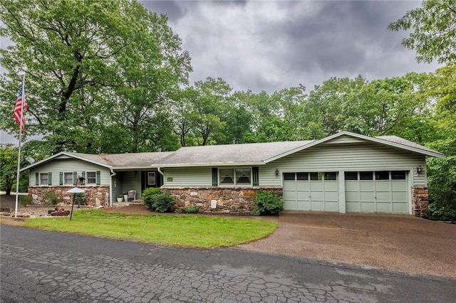 1 Panbury Ln, Bella Vista, AR 72715 - ranch-style home featuring stone siding, a garage, a front lawn, and driveway