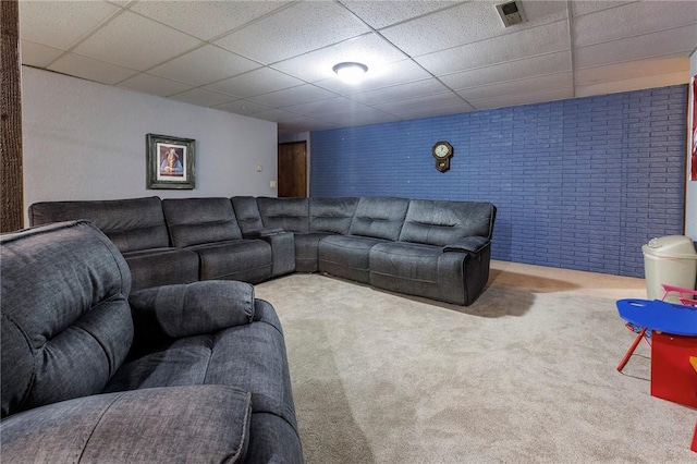 1 Panbury Ln, Bella Vista, AR 72715 - living area featuring brick wall, a paneled ceiling, and carpet floors