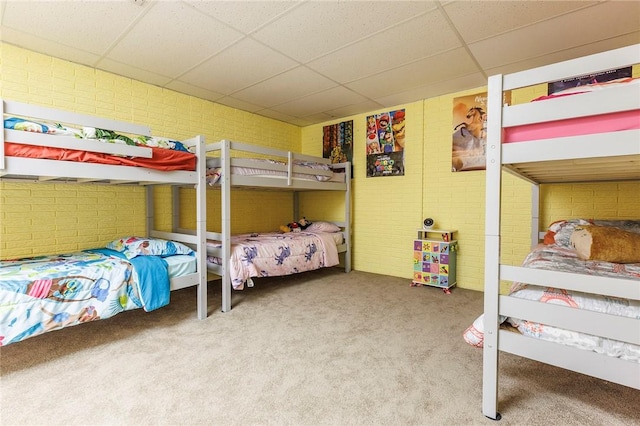 1 Panbury Ln, Bella Vista, AR 72715 - carpeted bedroom with a paneled ceiling and brick wall
