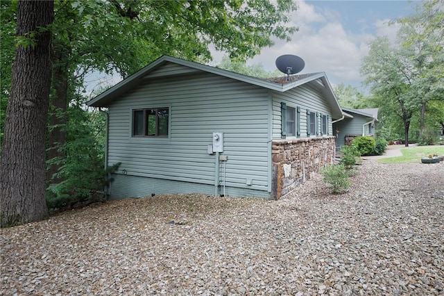 1 Panbury Ln, Bella Vista, AR 72715 - view of side of home with stone siding