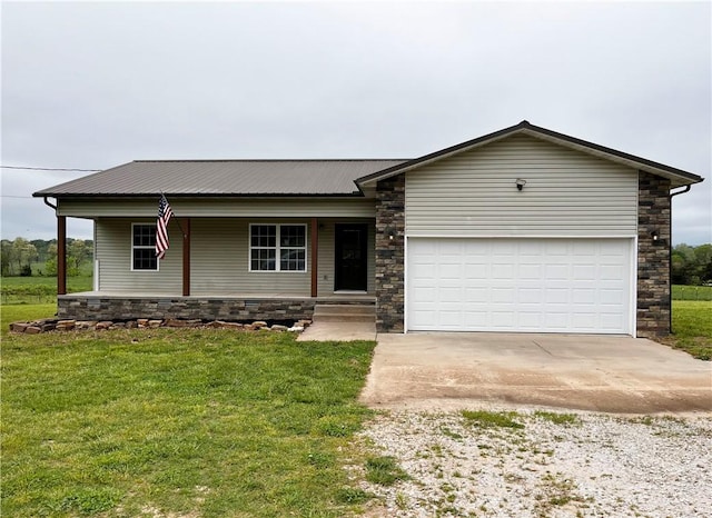 ranch-style house with a garage, driveway, a front lawn, and stone siding