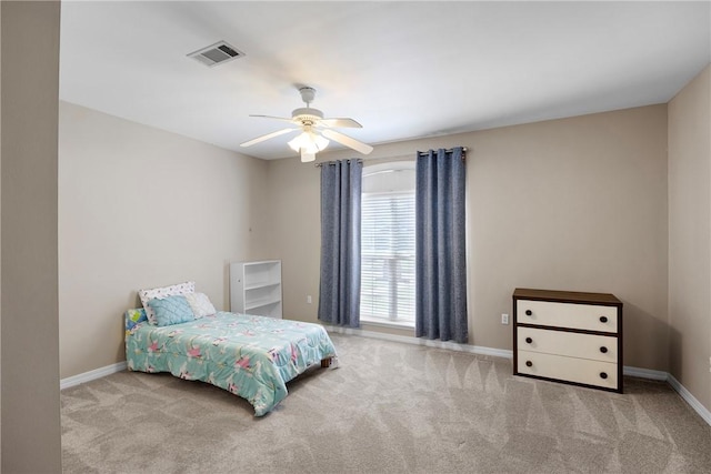 2314 W 7th St, Russellville, AR 72801 - carpeted bedroom with a ceiling fan, baseboards, and visible vents