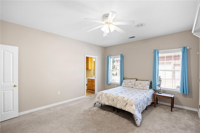 2314 W 7th St, Russellville, AR 72801 - bedroom featuring baseboards, multiple windows, light carpet, and visible vents