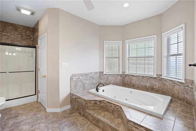 2314 W 7th St, Russellville, AR 72801 - full bathroom with visible vents, toilet, baseboards, a tub with jets, and a shower stall