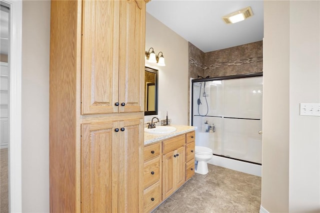 2314 W 7th St, Russellville, AR 72801 - bathroom featuring vanity, a stall shower, toilet, and visible vents