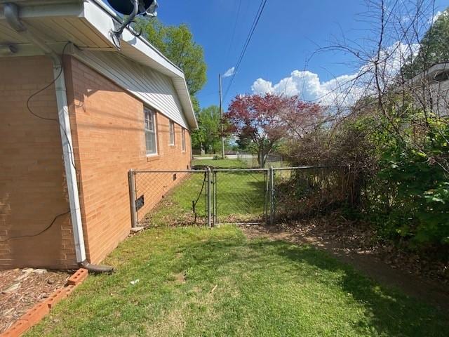 503 Skyline Dr, Harrison, AR 72601 - view of side of home featuring a gate and brick siding